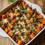 Once everything is cooked through, transfer the mixture to the prepared baking dish and spread it out evenly Recipe