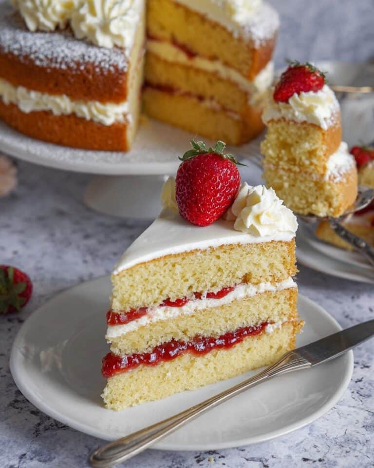 Victoria Sponge Cake with Strawberry Jam and Fresh Strawberries Recipe